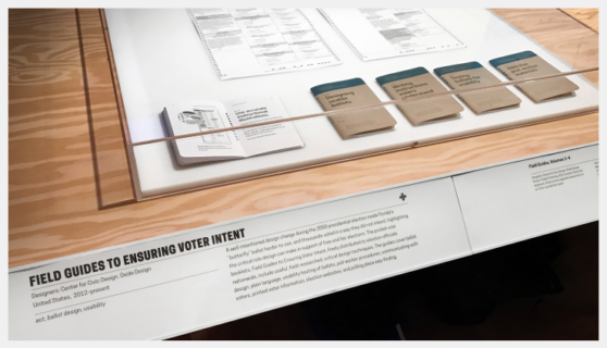 Field Guides under glass as part of a museum exhibit